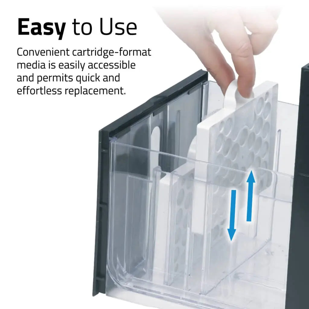 Hand sliding a Fluval Kühl fine filter pad cartridge into the filter compartment, showing easy replacement