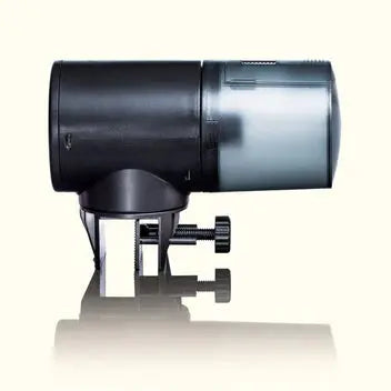 Aquarium Co-Op Auto Feeder automatic battery-powered fish feeder mounted on aquarium rim