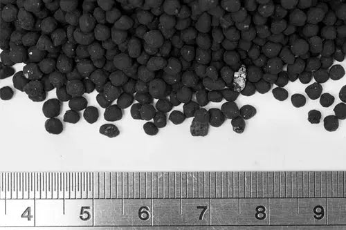 UNS Controsoil Black Fine aquasoil granules shown next to a ruler for scale